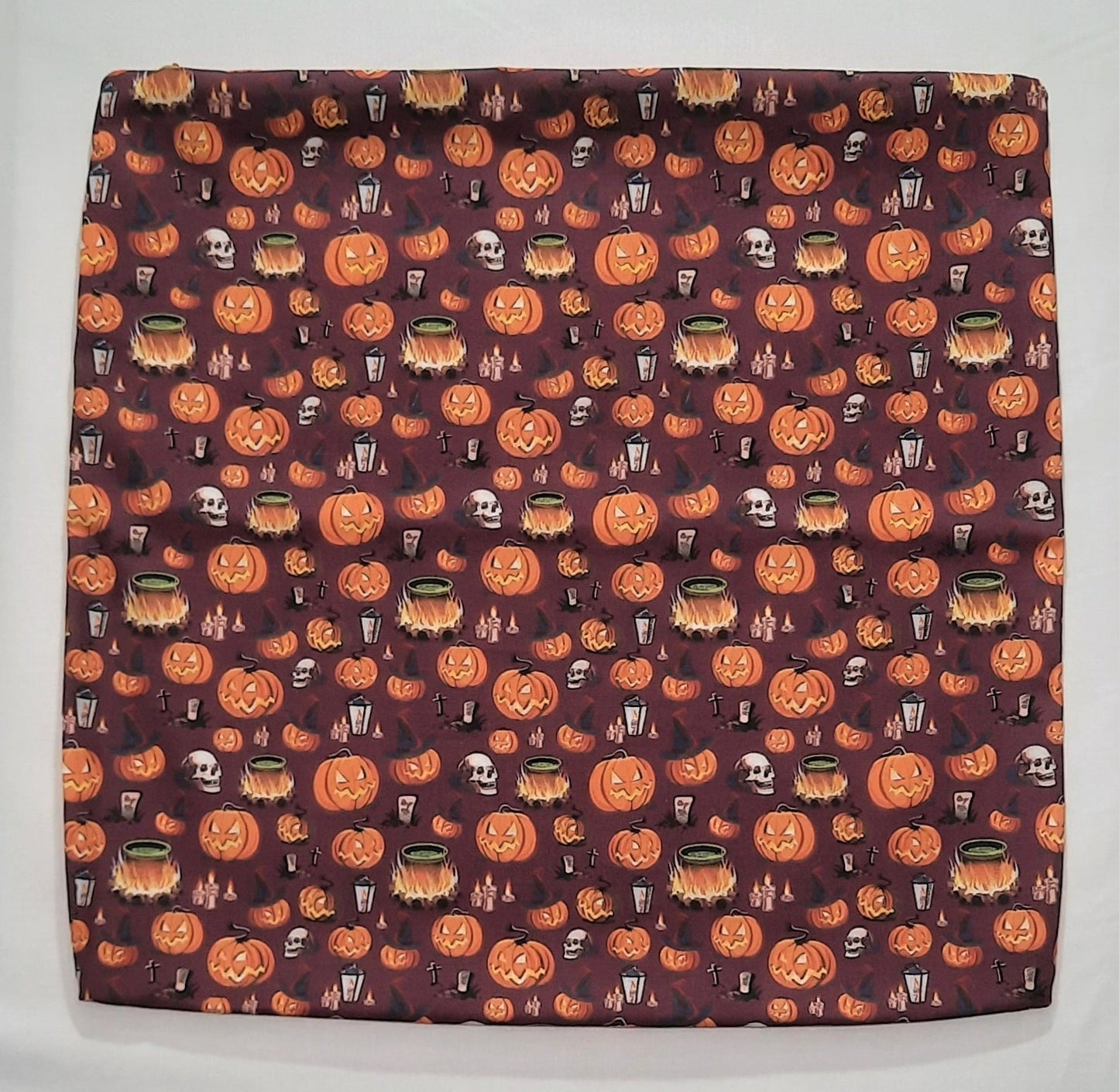 Pumpkin and skulls Halloween pattern front and back. Size: 18"x18"