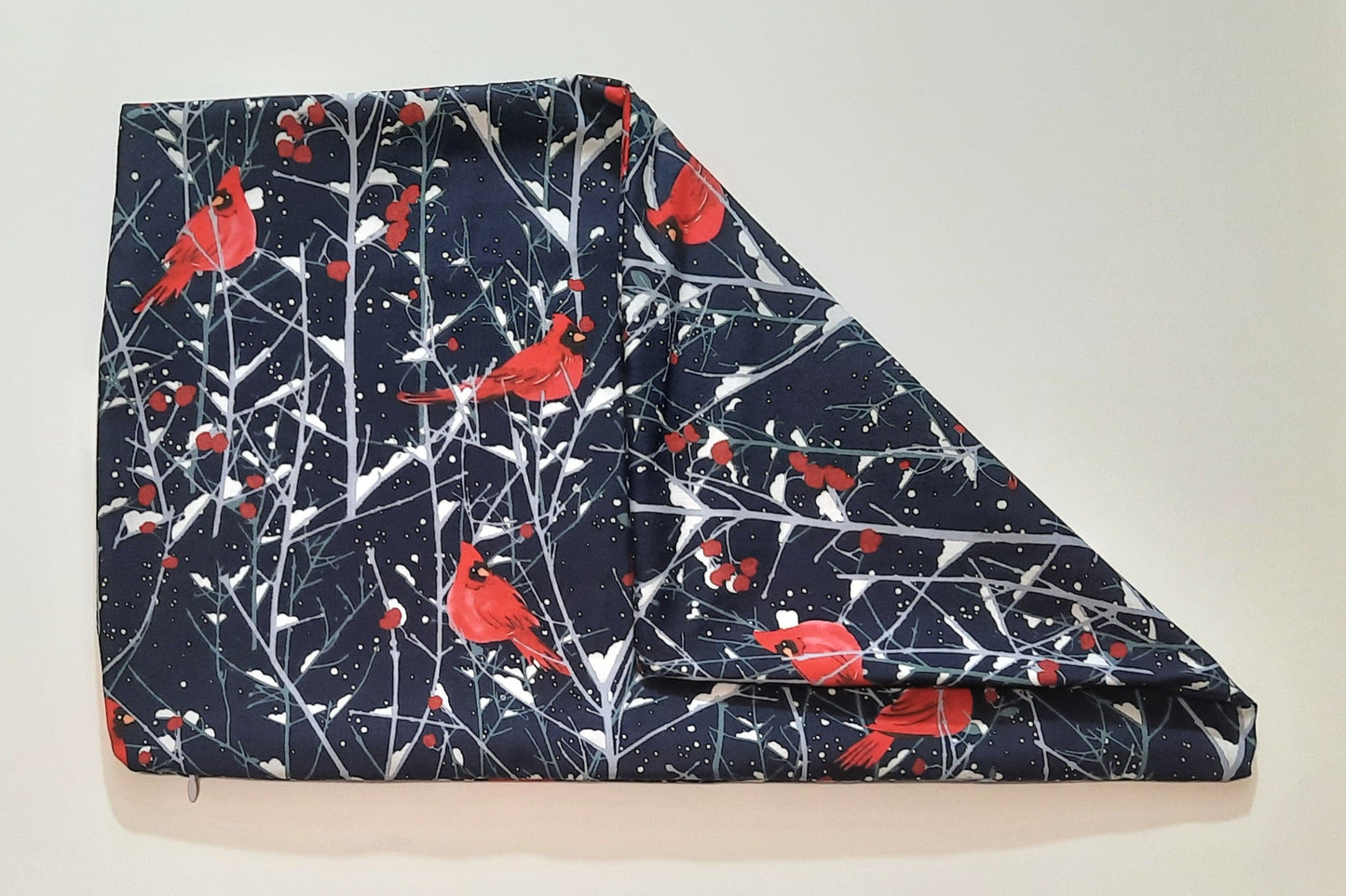 12"x18" Travel Pillow Cover. Dark blue with cardinals.