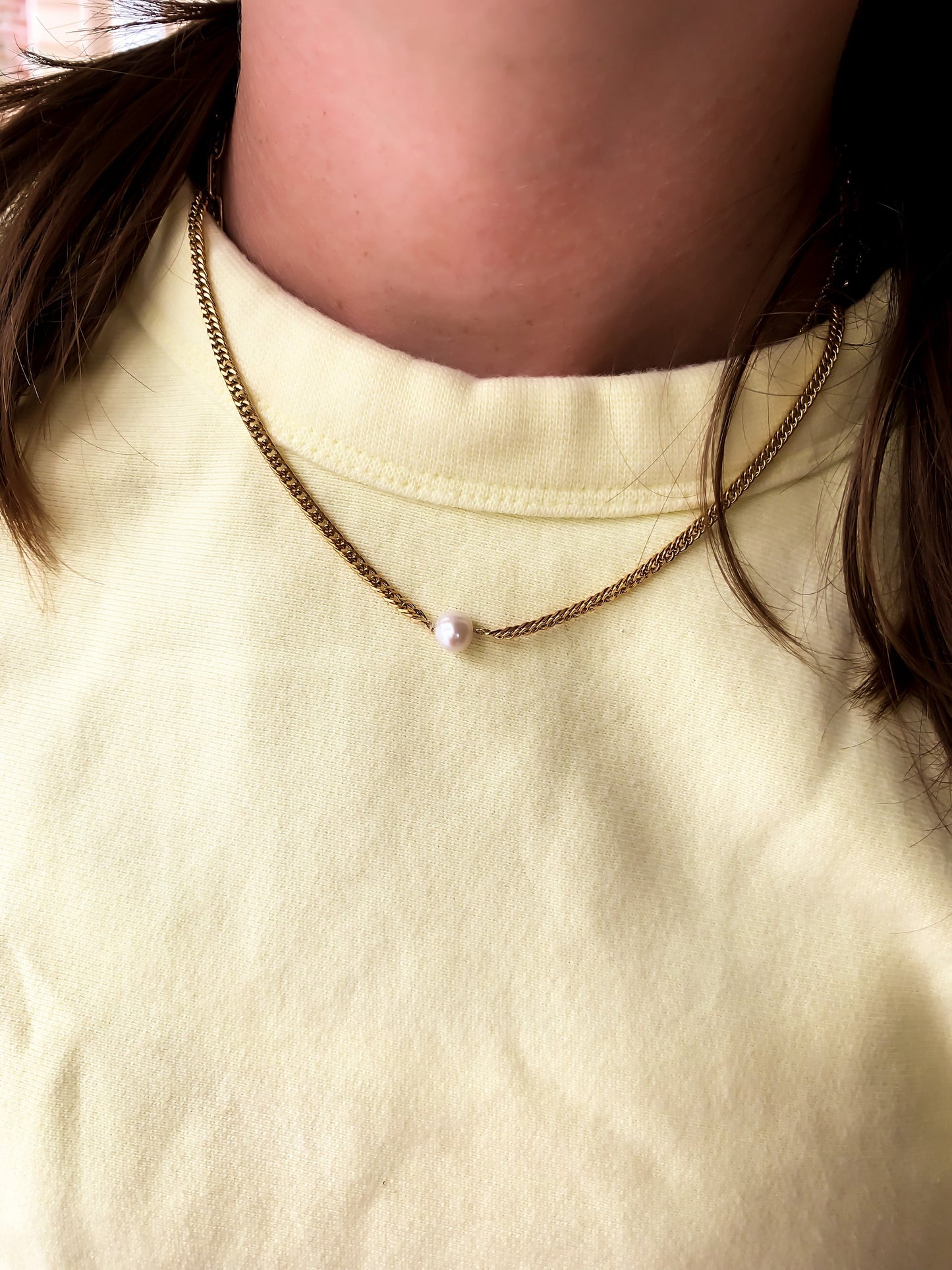 Pearl on feather necklace