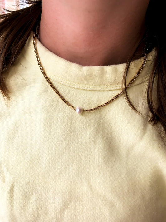 Pearl on feather necklace