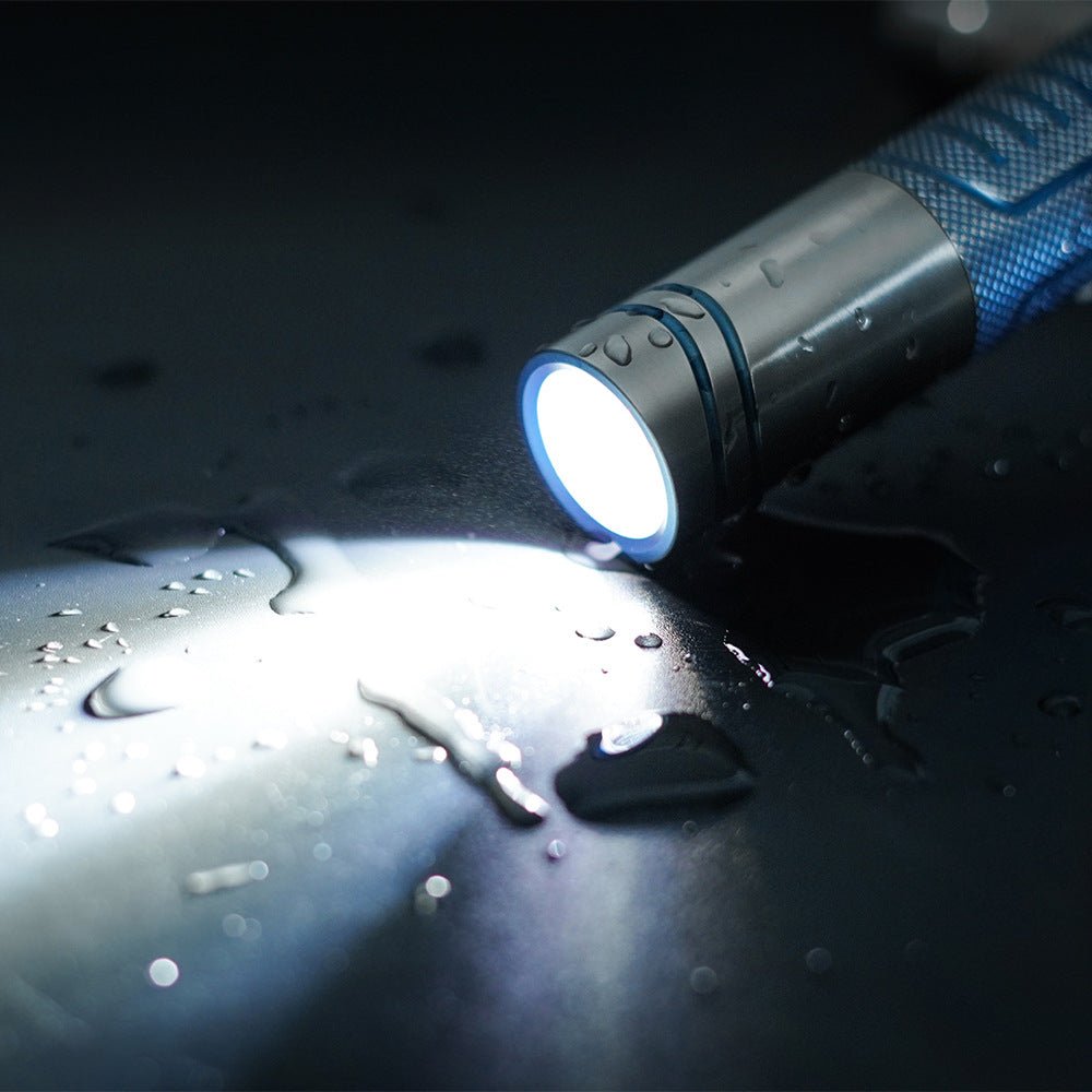 Titanium alloy ultra - bright flashlight with magnetic charging and secure magnetic attachment, designed for rugged durability and versatile hands - free illumination - Wautton Outdoor Gear - Little Red General Store